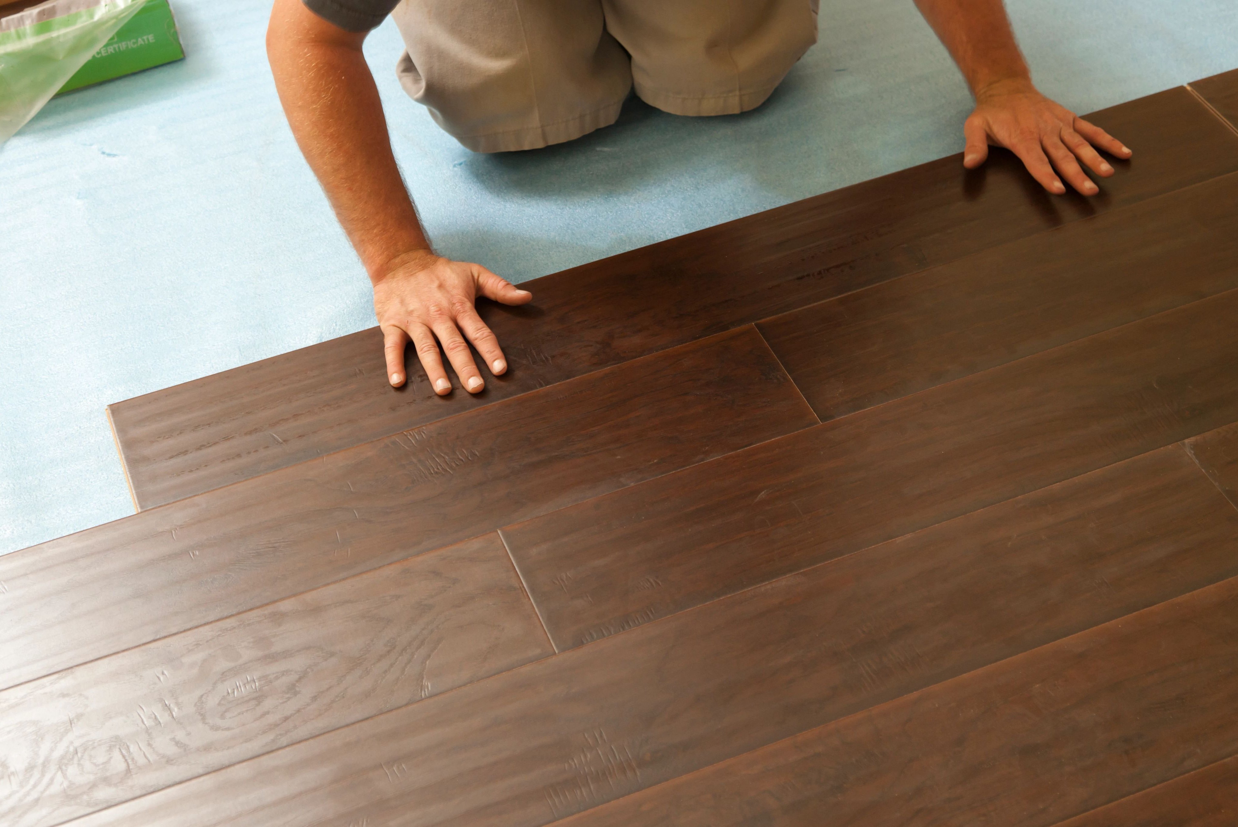 Person installing Hardwood Flooring from Carpet On Wheels in the Jamesburg, NJ area